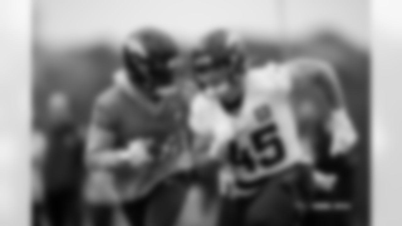 JL Skinner and Nate Adkins during practice in Ware, England on October 10, 2025. Photo by Ben Swanson / Denver Broncos