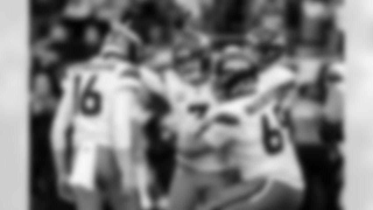 Denver Broncos placekicker Wil Lutz (3) celebrates with punter Jeremy Crawshaw (16), offensive tackle Mike McGlinchey (69), tight end Adam Trautman (82) and others after kicking a game-winning field goal during the Broncos' Week 9 game against the Houston Texans at NRG Stadium in Houston, Texas on November 2, 2025. Photo by Ben Swanson / Denver Broncos