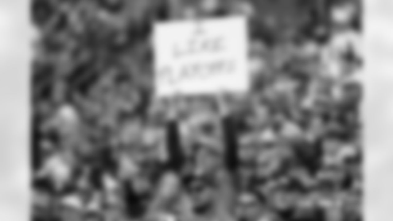 A fan holds a sign that says "I Like Playoffs" during the Broncos' Week 18 game against the Los Angeles Chargers at Empower Field at Mile High in Denver, Colorado on January 4, 2026. Photo by Ben Swanson / Denver Broncos