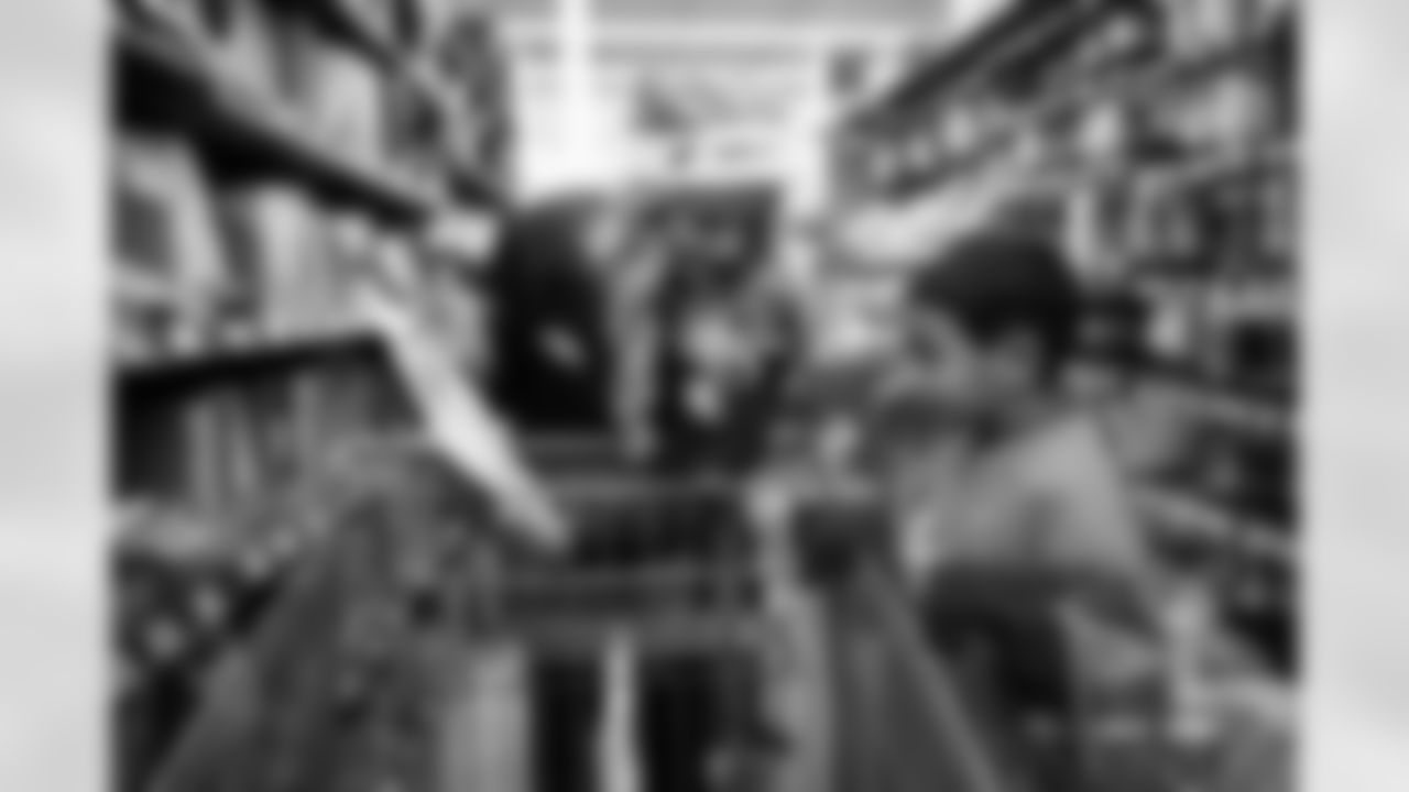 Children from the Boys & Girls Club participate in a Shop with a Jock shopping spree with Broncos players, alumni and cheerleader alumni in Aurora, Colorado on December 15, 2025. Photo by Ben Swanson / Denver Broncos