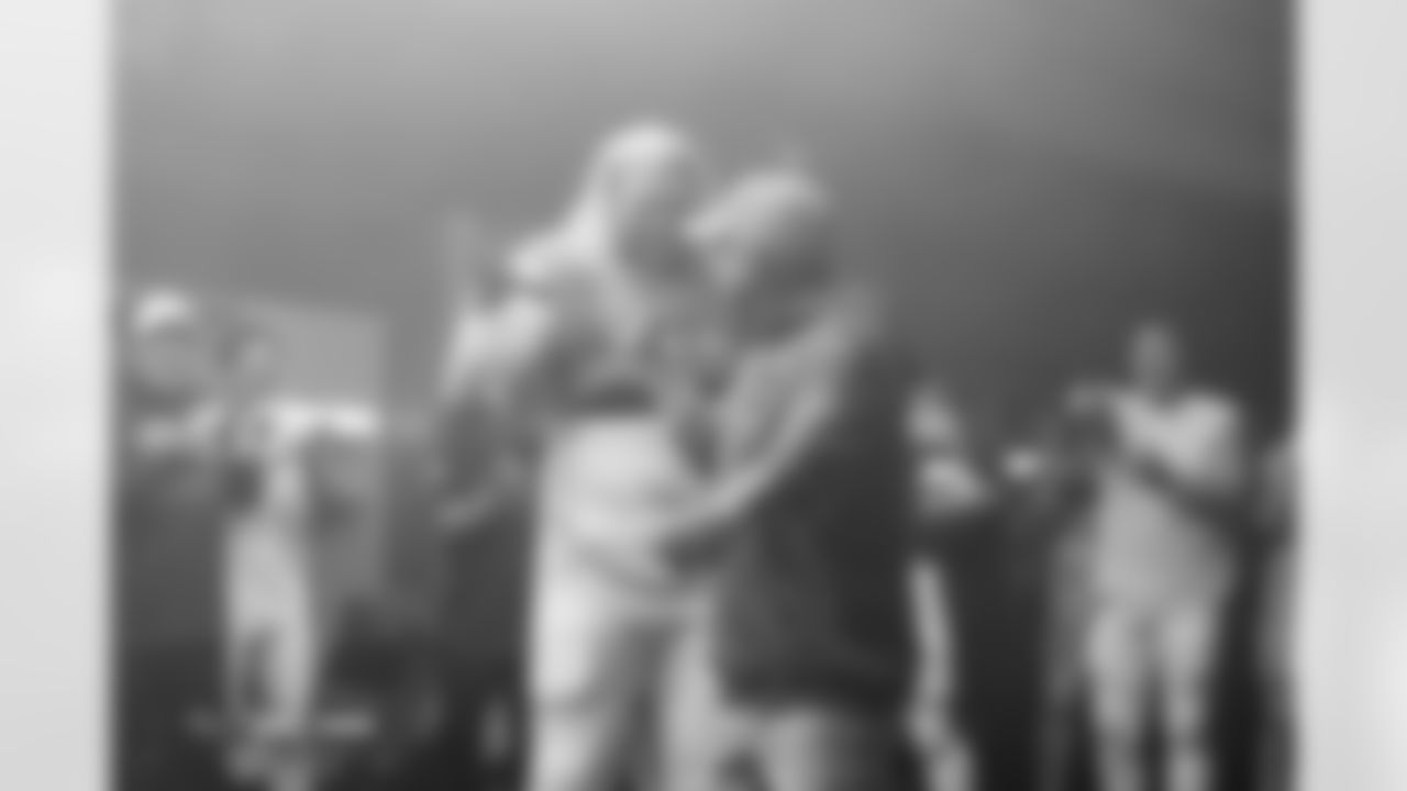 Frank Crum and Sean Payton after the Broncos' Week 11 game against the Kansas City Chiefs at Empower Field at Mile High in Denver, Colorado on November 16, 2025. Photo by Gabriel Christus / Denver Broncos