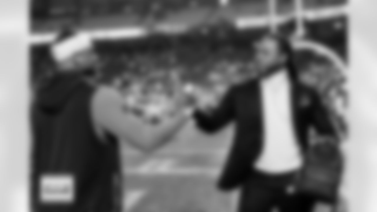 Pat Surtain II greets Richard Sherman before the Broncos' Week 17 game against the Kansas City Chiefs at GEHA Field at Arrowhead Stadium in Kansas City, Missouri on December 25, 2025. Photo by Ben Swanson / Denver Broncos