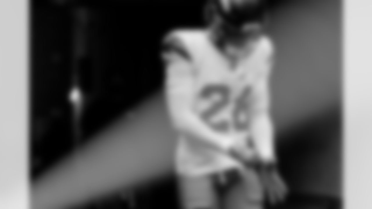 Denver Broncos safety Devon Key (26) adjusts his gloves as he walks out of the tunnel before the Broncos' Week 9 game against the Houston Texans at NRG Stadium in Houston, Texas on November 2, 2025. Photo by Gabriel Christus / Denver Broncos