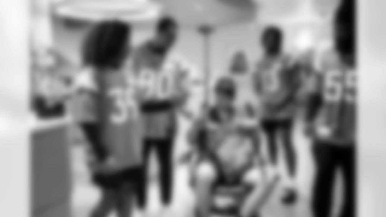 Kyrese White, Joaquin Davis, Pat Bryant and other Denver Broncos rookies visit with children at Children's Hospital Colorado in Aurora, Colorado on June 2, 2025. Photo by Ben Swanson / Denver Broncos
