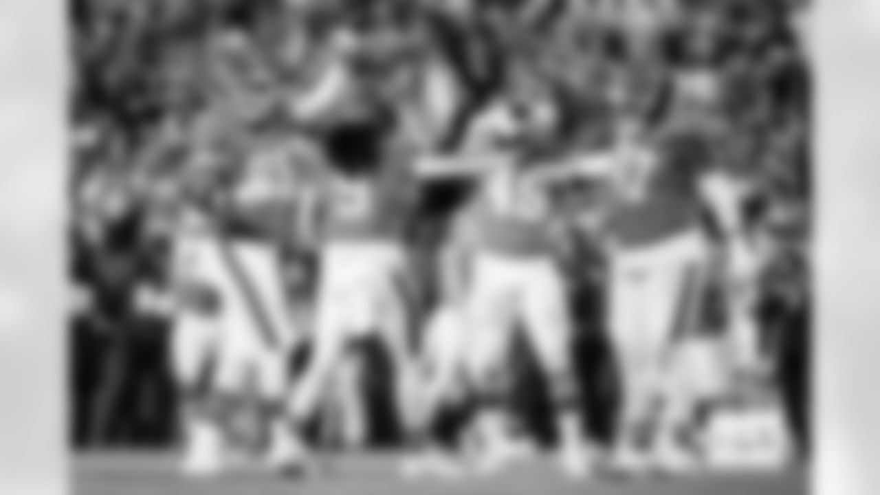 Denver Broncos safety Talanoa Hufanga (9) celebrates after a fourth-down sack with defensive end Zach Allen (99), linebacker Alex Singleton (49) and defensive tackle Malcolm Roach (97) during the Broncos' Week 10 game against the Las Vegas Raiders at Empower Field at Mile High in Denver, Colorado on November 6, 2025. Photo by Ben Swanson / Denver Broncos