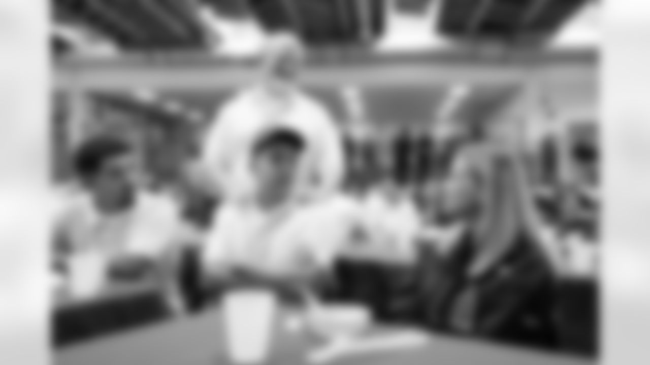 Carrie Walton Penner talks with inmates at lunch during a visit to the Arkansas Valley Correctional Facility in Ordway, Colorado on October 14, 2025. In partnership with the Vera Institute of Justice, the Denver Broncos Foundation toured ChangeMakers Village (a Restoring Promise Unit).Photo by Gabriel Christus / Denver Broncos