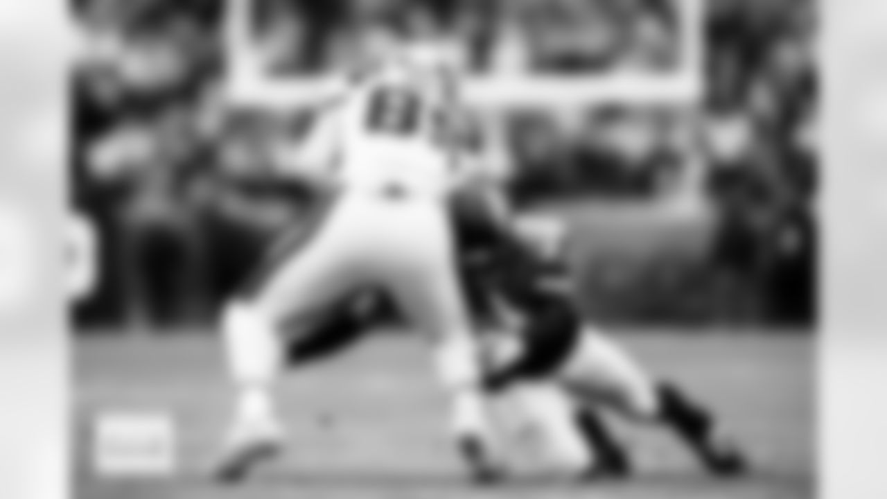 Denver Broncos cornerback Pat Surtain II (2) tackles New England Patriots tight end Hunter Henry (85) during the AFC Championship Game between the Denver Broncos and New England Patriots at Empower Field at Mile High in Denver, Colorado on January 25, 2026. Photo by Ben Swanson / Denver Broncos