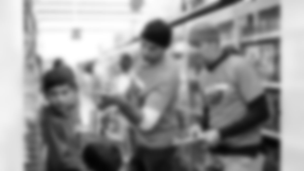 Children from the Denver Broncos Boys & Girls Club participate in a Shop with a Jock shopping spree with Broncos players, alumni and cheerleader alumni in Aurora, Colorado on December 2, 2025. Photo by Ben Swanson / Denver Broncos