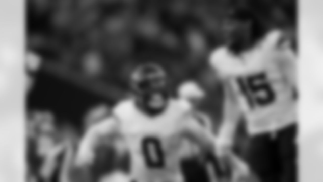 Denver Broncos linebacker Jonathon Cooper (0) reacts with linebacker Nik Bonitto (15) after a sack during the Broncos' Week 6 game against the New York Jets at Tottenham Hotspur Stadium in London, England on October 12, 2025. Photo by Gabriel Christus / Denver Broncos