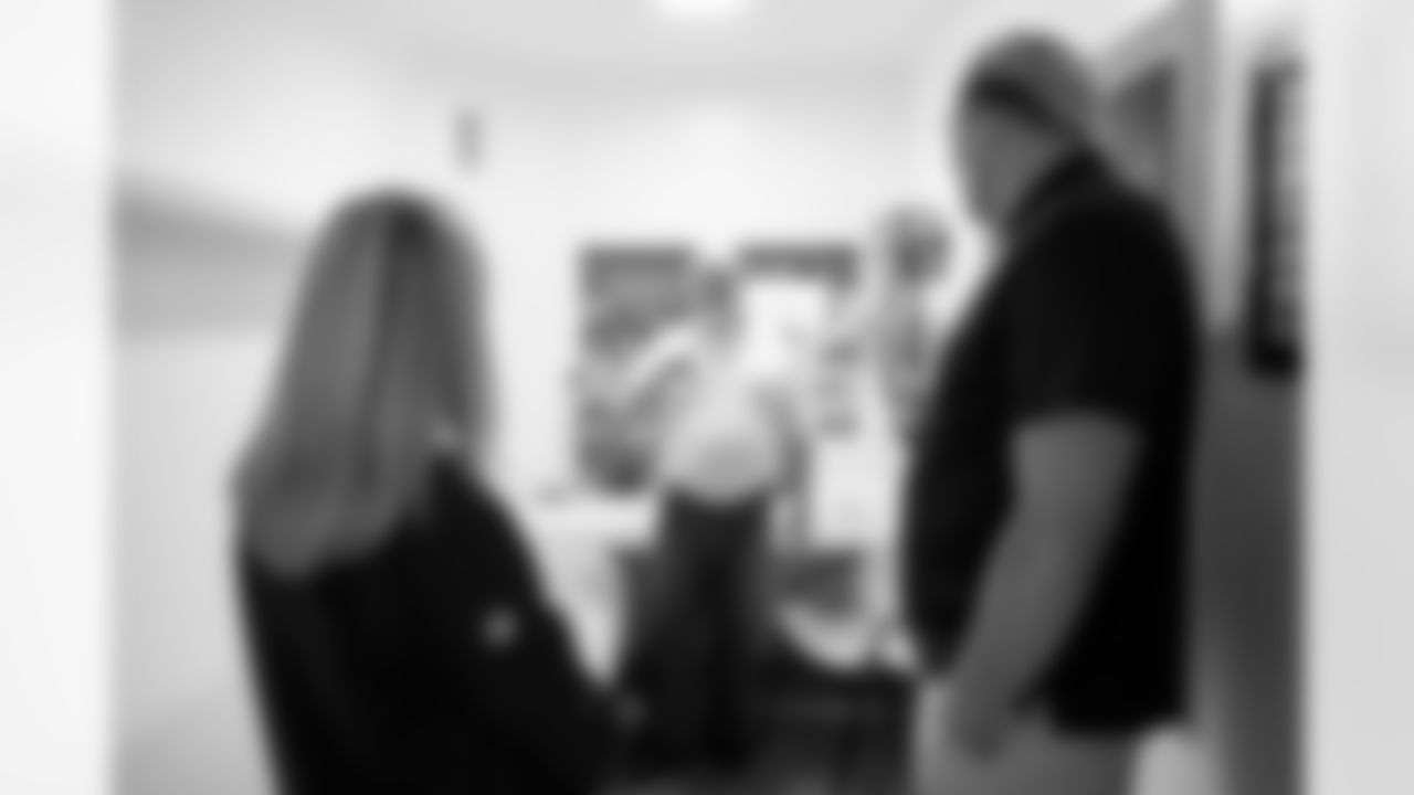 An inmate shows his room to Garett Bolles and Carrie Walton Penner during a visit to the Arkansas Valley Correctional Facility in Ordway, Colorado on October 14, 2025. In partnership with the Vera Institute of Justice, the Denver Broncos Foundation toured ChangeMakers Village (a Restoring Promise Unit).Photo by Gabriel Christus / Denver Broncos