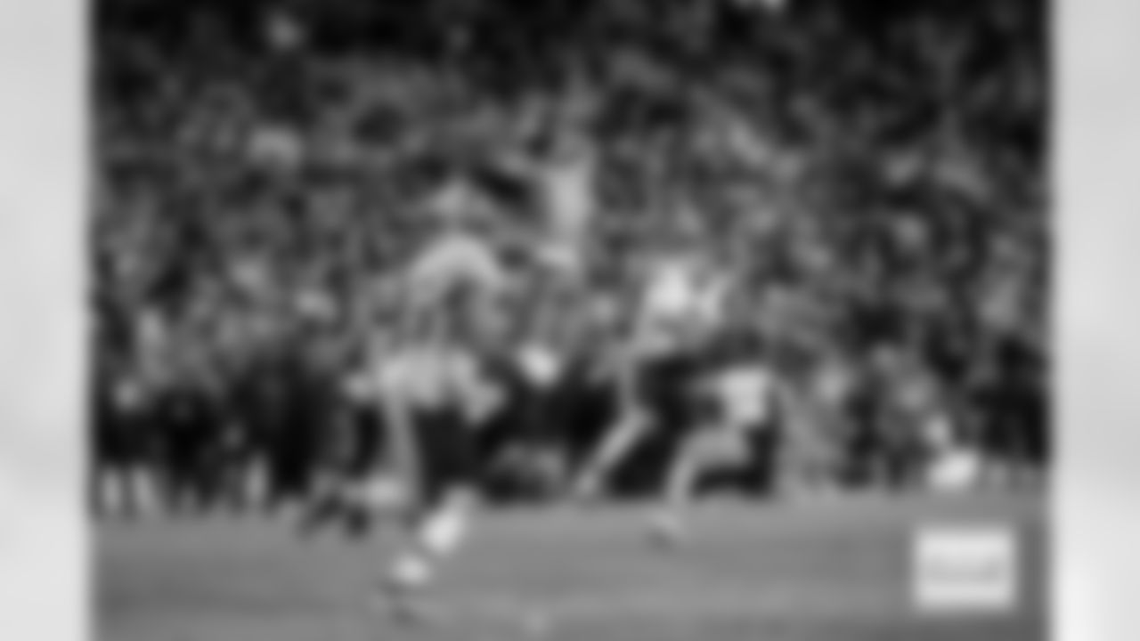 Denver Broncos linebacker Nik Bonitto (15) blocks Washington Commanders quarterback Marcus Mariota (8)'s pass on the potential game-winning two-point conversion attempt during overtime of the Broncos' Week 13 game against the Washington Commanders at Northwest Stadium in Landover, Maryland on November 30, 2025. Photo by Ben Swanson / Denver Broncos