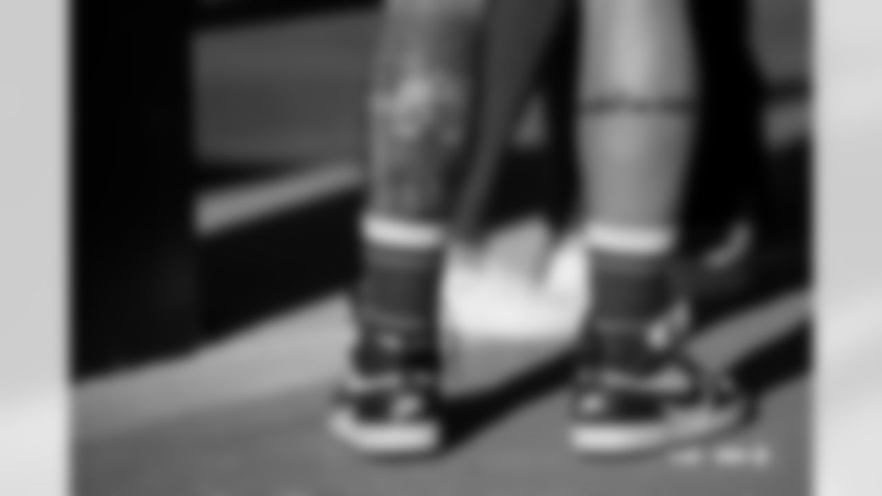 A fan with a tattoo of Mile High Stadium and Demaryius Thomas before the Broncos' Week 18 game against the Los Angeles Chargers at Empower Field at Mile High in Denver, Colorado on January 4, 2026. Photo by Ben Swanson / Denver Broncos