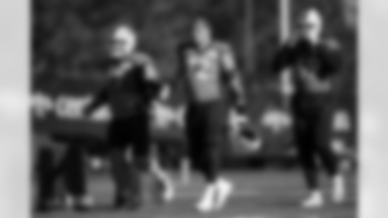 Quinn Meinerz, Garett Bolles and Mike McGlinchey during practice at Centura Health Training Center in Englewood, Colorado on December 21, 2023. Photo by Ben Swanson / Denver Broncos
