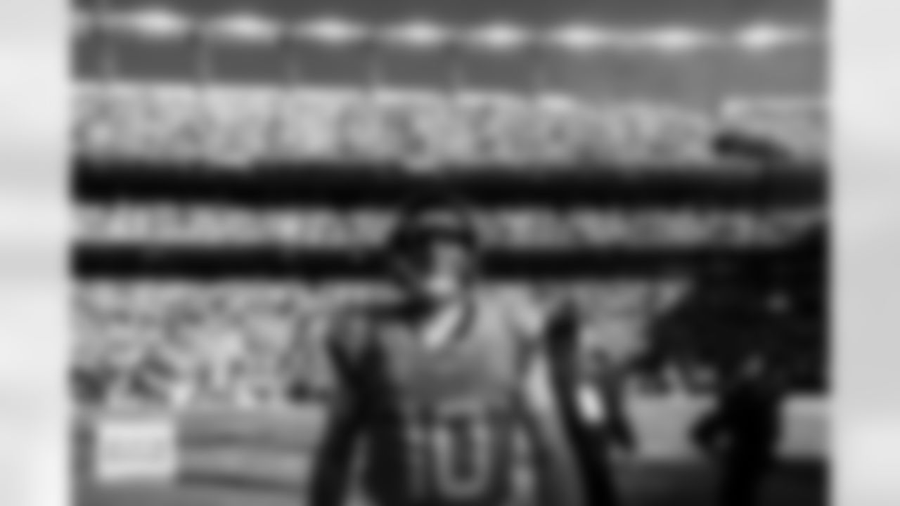 Denver Broncos quarterback Bo Nix (10) walks back from the coin toss before the Broncos' Divisional Round playoff game against the Buffalo Bills at Empower Field at Mile High in Denver, Colorado on January 17, 2026. Photo by Gabriel Christus / Denver Broncos