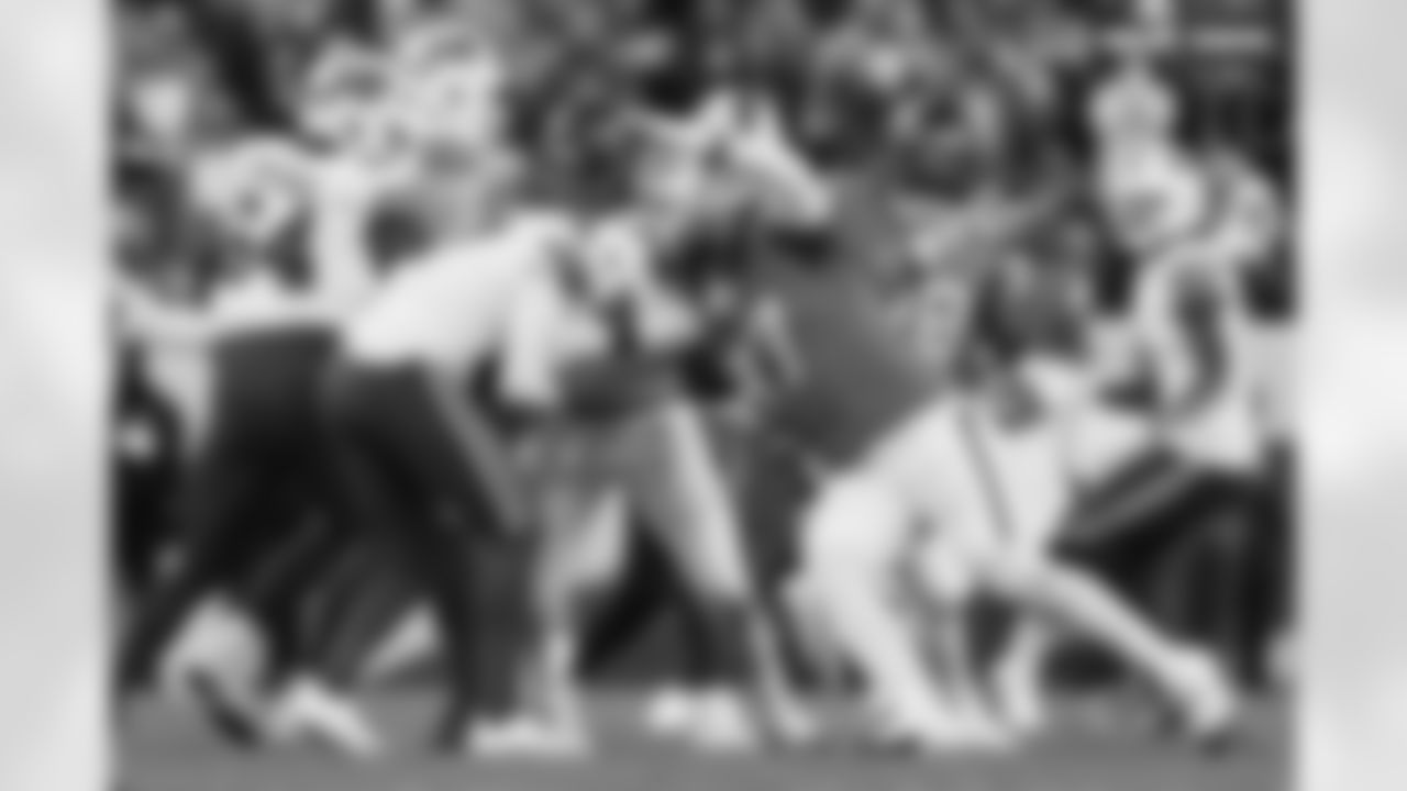 Zach Allen and Malcolm Roach (97) during the Broncos' Divisional Round playoff game against the Buffalo Bills at Empower Field at Mile High in Denver, Colorado on January 17, 2026. Photo by Ben Swanson / Denver Broncos