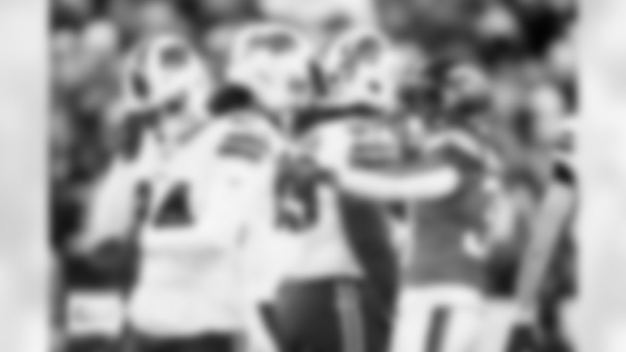 Denver Broncos running back Jaleel McLaughlin (38) celebrates a run with a chunk of grass stuck in his facemask during the Broncos' Divisional Round playoff game against the Buffalo Bills at Empower Field at Mile High in Denver, Colorado on January 17, 2026. Photo by Gavin Liddell / Denver Broncos