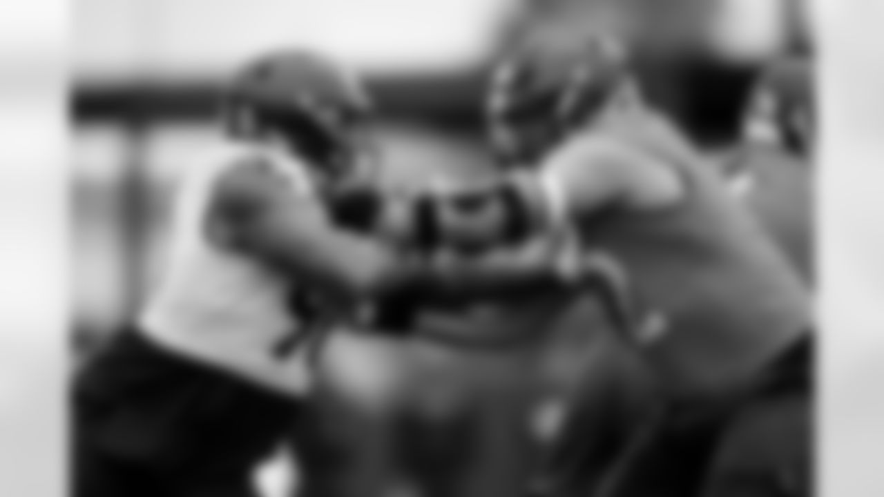 Eyioma Uwazurike and Garett Bolles during an OTA practice at Broncos Park Powered by CommonSpirit in Englewood, Colorado on May 29, 2025. Photo by Ben Swanson / Denver Broncos