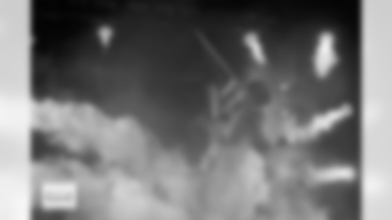 Denver Broncos wide receiver Courtland Sutton (14) runs with an American flag in the tunnel for team introductions before the Broncos' Week 11 game against the Kansas City Chiefs at Empower Field at Mile High in Denver, Colorado on November 16, 2025. Photo by Gabriel Christus / Denver Broncos