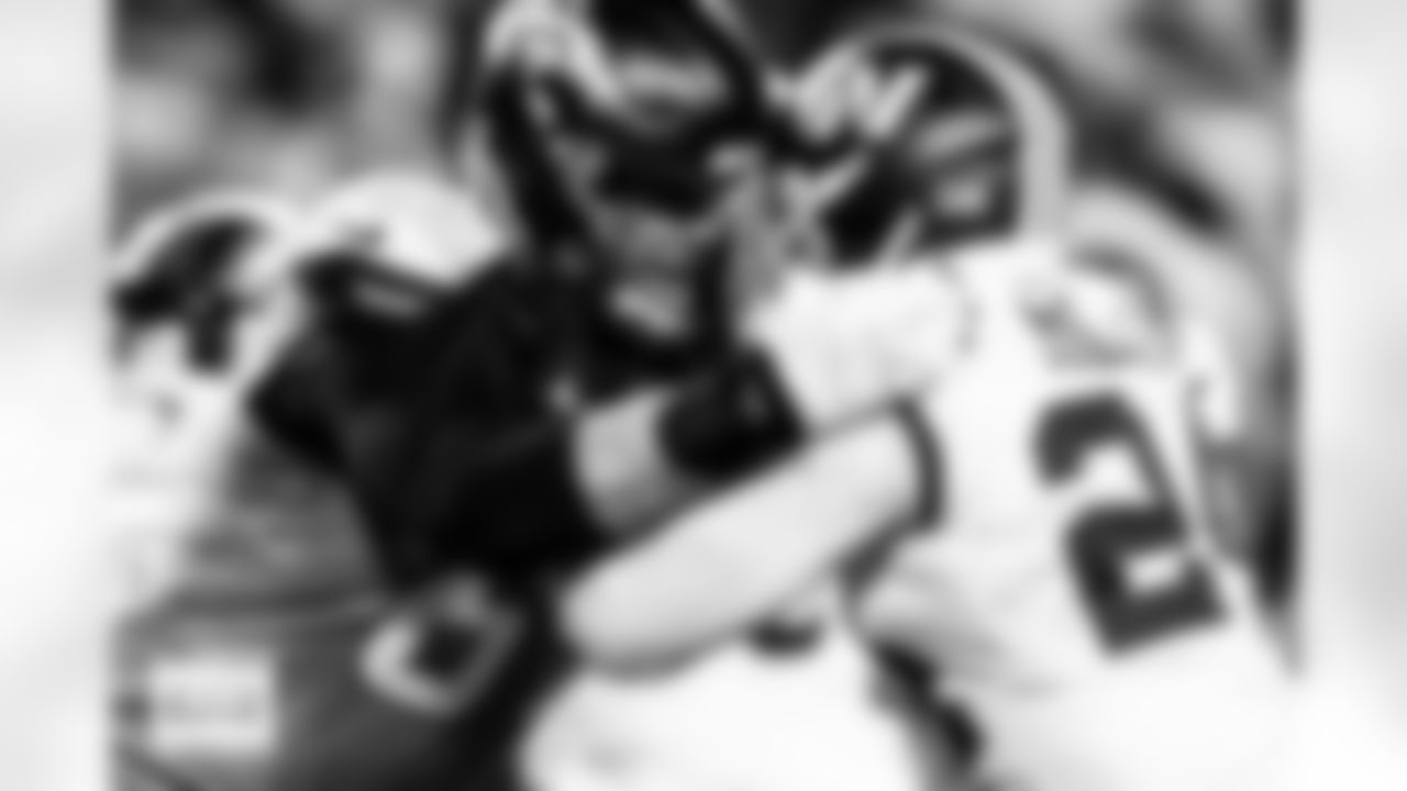 Denver Broncos offensive tackle Mike McGlinchey (69) blocks Washington Commanders linebacker Von Miller (24) during the Broncos' Week 13 game against the Washington Commanders at Northwest Stadium in Landover, Maryland on November 30, 2025. Photo by Ben Swanson / Denver Broncos