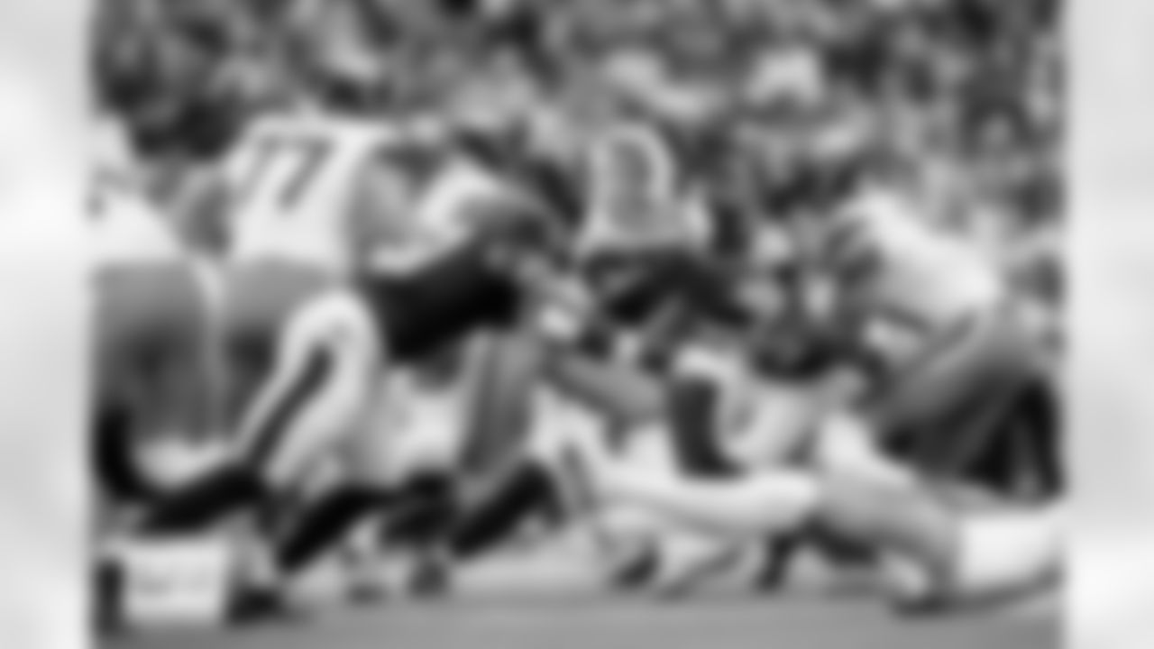 Denver Broncos running back J.K. Dobbins (27) runs with the ball as wide receiver Courtland Sutton (14) blocks during the Broncos' Week 9 game against the Houston Texans at NRG Stadium in Houston, Texas on November 2, 2025. Photo by Gabriel Christus / Denver Broncos