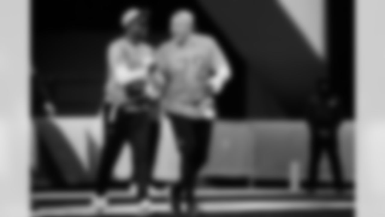 AFC wide receiver Tee Higgins (5), of the Cincinnati Bengals, and offensive tackle Garett Bolles (72), of the Denver Broncos, shake hands during NFL Pro Bowl Games practice, Monday, Feb. 2, 2026, in San Francisco. (AP Photo/Godofredo A. Vásquez)