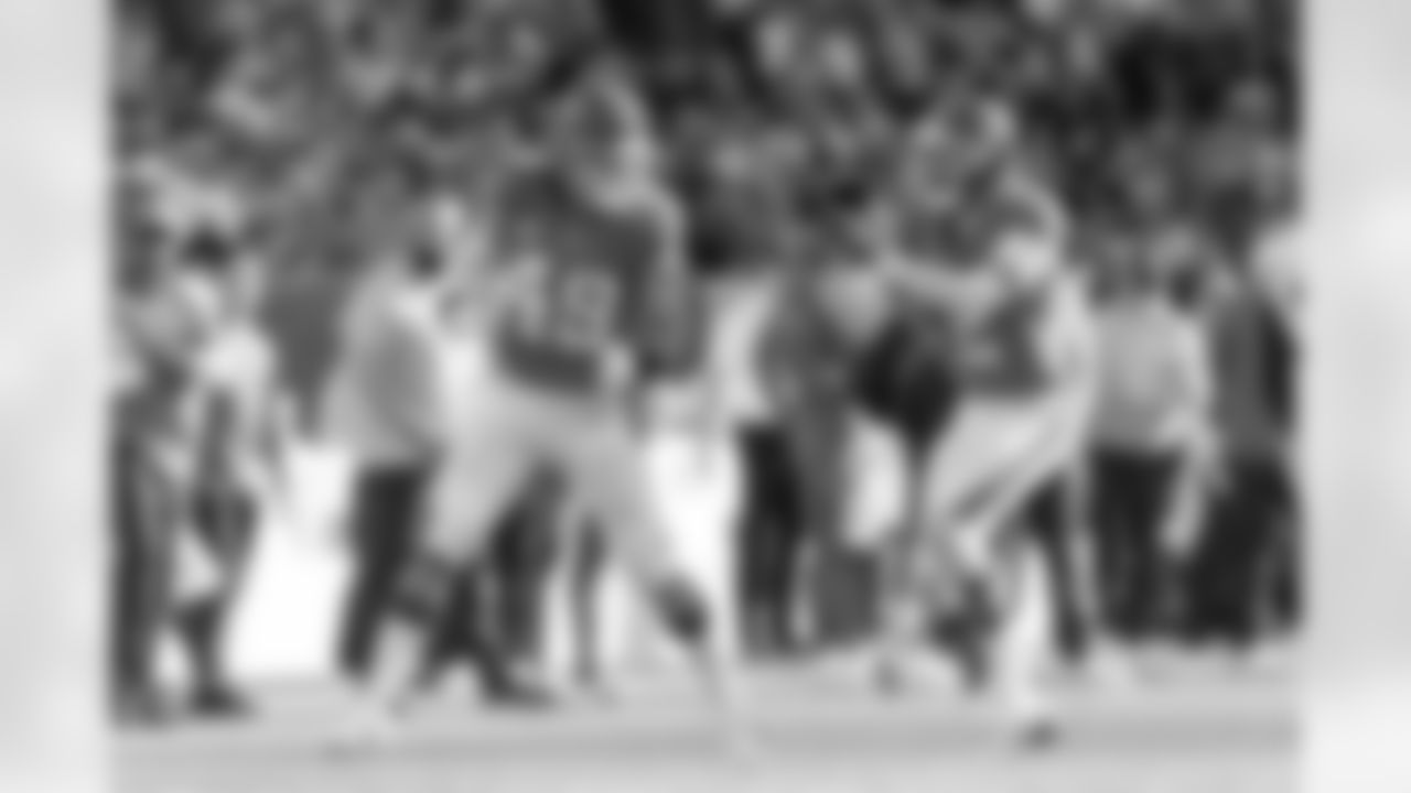 Denver Broncos linebacker Alex Singleton (49) and cornerback Pat Surtain II (2) celebrate after a play during the Broncos' Week 18 game against the Los Angeles Chargers at Empower Field at Mile High in Denver, Colorado on January 4, 2026. Photo by Gabriel Christus / Denver Broncos