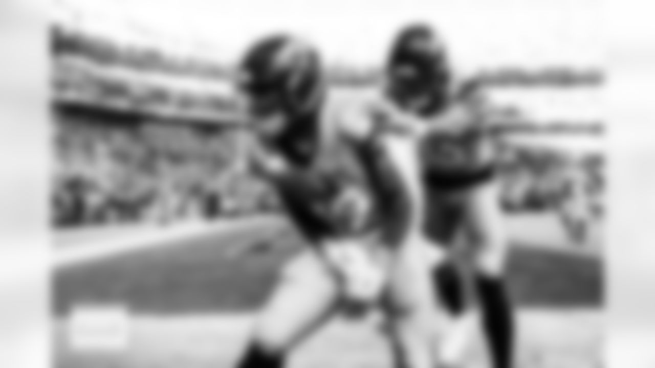 Denver Broncos running back RJ Harvey (12) celebrates a touchdown with wide receiver Pat Bryant (13) during the Broncos' Week 16 game against the Jacksonville Jaguars at Empower Field at Mile High in Denver, Colorado on December 21, 2025. Photo by Ben Swanson / Denver Broncos