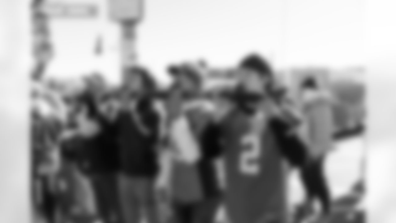 Denver Broncos fans drink shots from a shotski before the Broncos' Divisional Round playoff game against the Buffalo Bills at Empower Field at Mile High in Denver, Colorado on January 17, 2026. Photo by Gabriel Christus / Denver Broncos