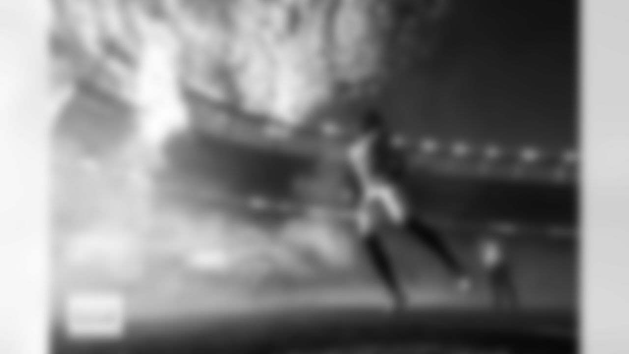 runs out of the tunnel for player introductions before the Broncos' Week 15 game against the Green Bay Packers at Empower Field at Mile High in Denver, Colorado on December 14, 2025. Photo by Gabriel Christus / Denver Broncos