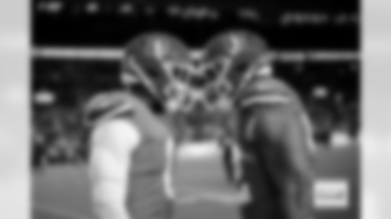 Denver Broncos linebacker Jonathon Cooper (0) and linebacker Jonah Elliss (52) before the Broncos' Week 10 game against the Las Vegas Raiders at Empower Field at Mile High in Denver, Colorado on November 6, 2025. Photo by Ben Swanson / Denver Broncos