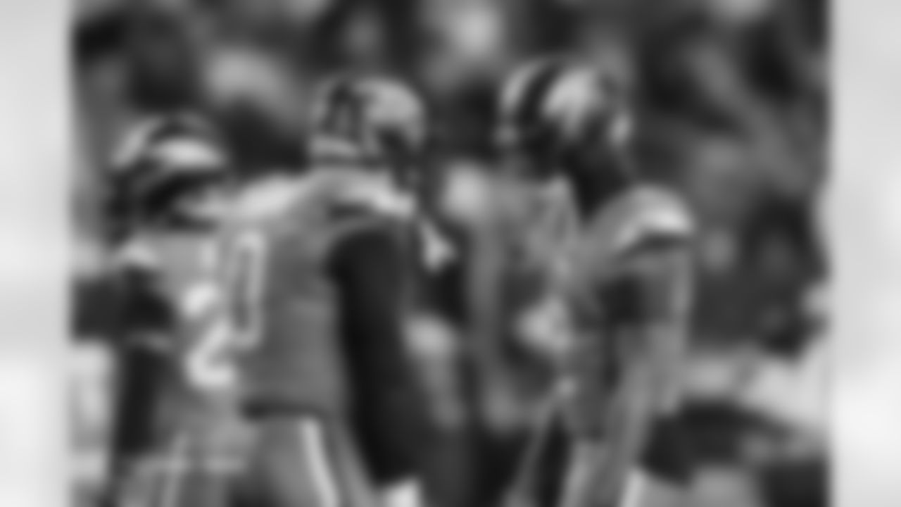 Jonathon Cooper (0) and Pat Surtain II (2) before the Broncos' Week 13 game against the Washington Commanders at Northwest Stadium in Landover, Maryland on November 30, 2025. Photo by Ben Swanson / Denver Broncos