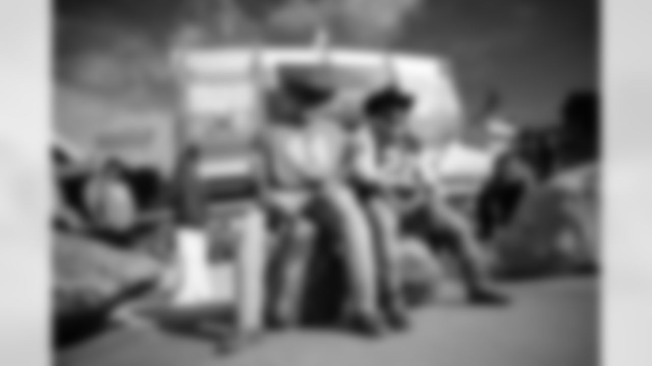 Fans pose together before the Broncos' Week 8 game against the Dallas Cowboys at Empower Field at Mile High in Denver, Colorado on October 26, 2025. Photo by Ben Swanson / Denver Broncos