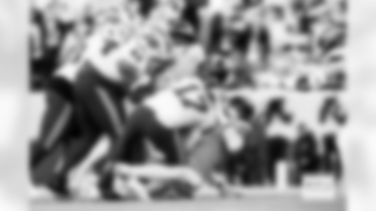 Denver Broncos defensive tackle Malcolm Roach (97) and defensive end Zach Allen (99) sack Buffalo Bills quarterback Josh Allen (17) during the Broncos' Divisional Round playoff game against the Buffalo Bills at Empower Field at Mile High in Denver, Colorado on January 17, 2026. Photo by Gabriel Christus / Denver Broncos