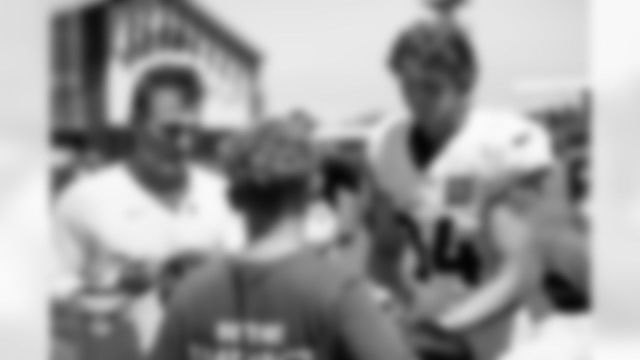 Bo Nix and Caleb Lohner sign autographs for fans during a training camp practice at Broncos Park Powered by CommonSpirit on July 28, 2025 in Englewood, Colorado. Photo by Ben Swanson / Denver Broncos