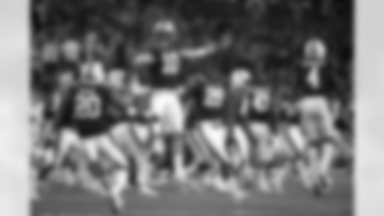 Auburn quarterback Bo Nix (10) celebrates with teammates after Auburn came from behind to defeat Oregon following an NCAA college football game, Saturday, Aug. 31, 2019, in Arlington, Texas. Auburn won 27-21. (AP Photo/Ron Jenkins)