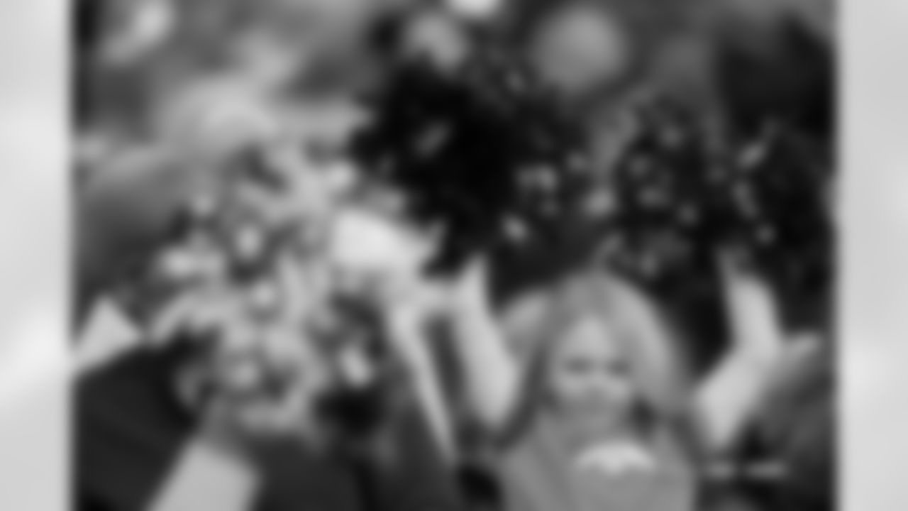 A Denver Broncos fan cheers during the Broncos' Week 15 game against the Green Bay Packers at Empower Field at Mile High in Denver, Colorado on December 14, 2025. Photo by Gabriel Christus / Denver Broncos