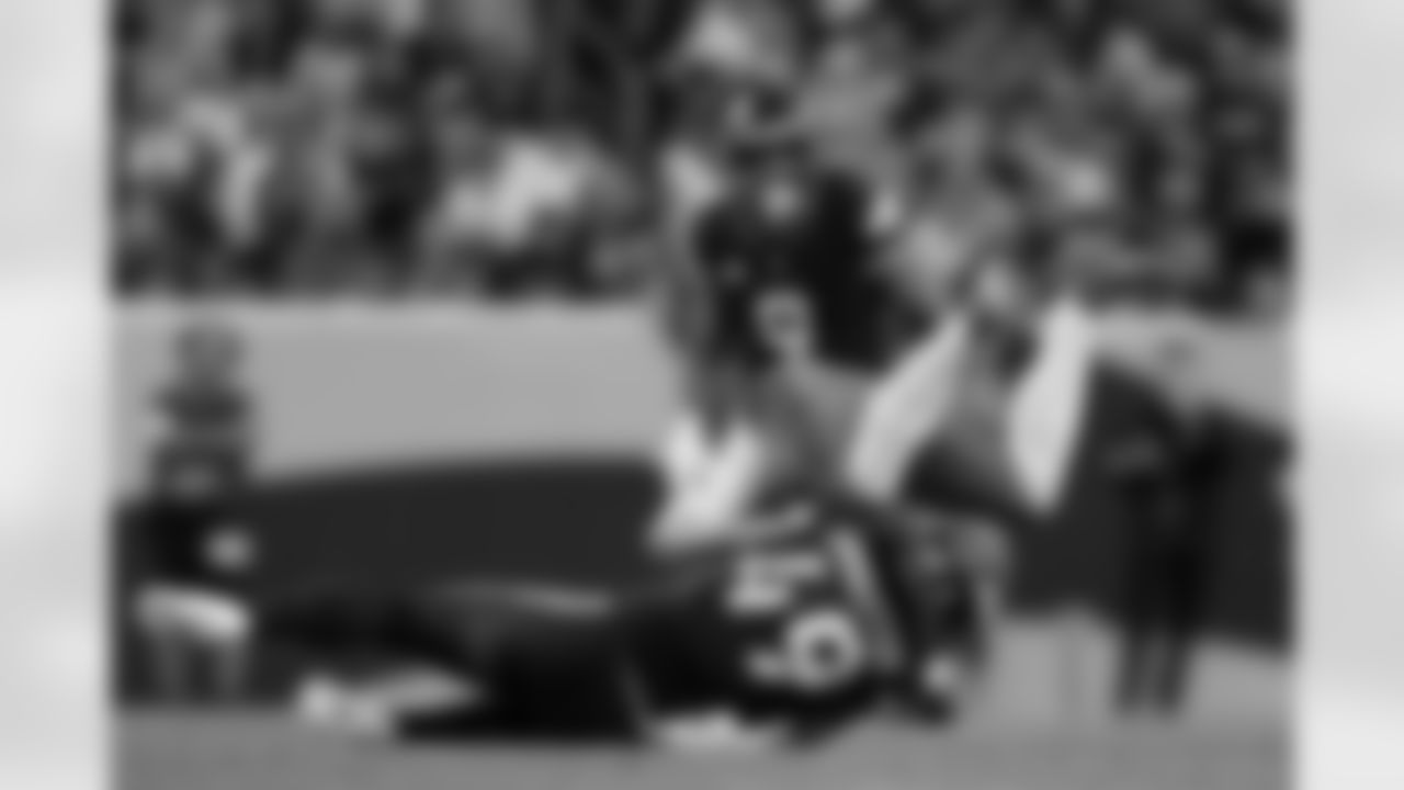 Denver Broncos linebacker Alex Singleton (49) tackles Cincinnati Bengals wide receiver Ja'Marr Chase (1) during the Broncos' Week 4 game against the Cincinnati Bengals at Empower Field at Mile High in Denver, Colorado on September 29, 2025. Photo by Gabriel Christus / Denver Broncos