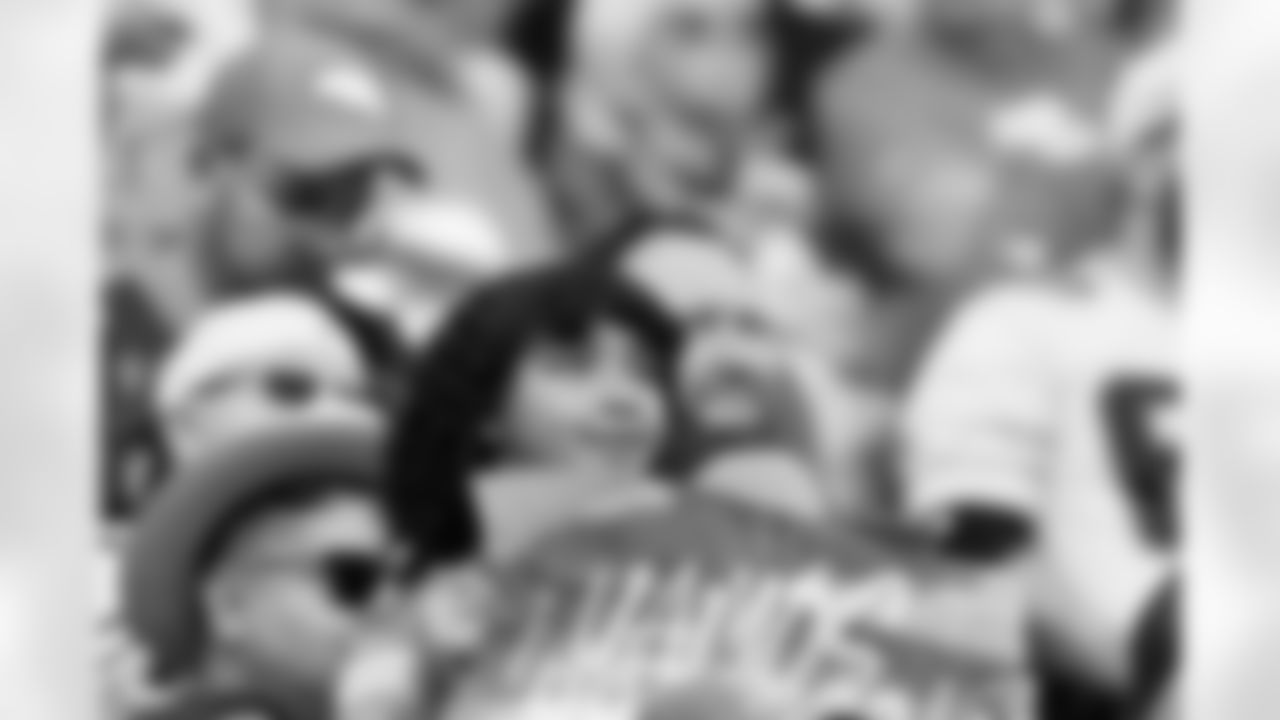 A young Denver Broncos fan holds a "Vamos Broncos!" sign during the Broncos' Week 8 game against the Dallas Cowboys at Empower Field at Mile High in Denver, Colorado on October 26, 2025. Photo by Gavin Liddell / Denver Broncos