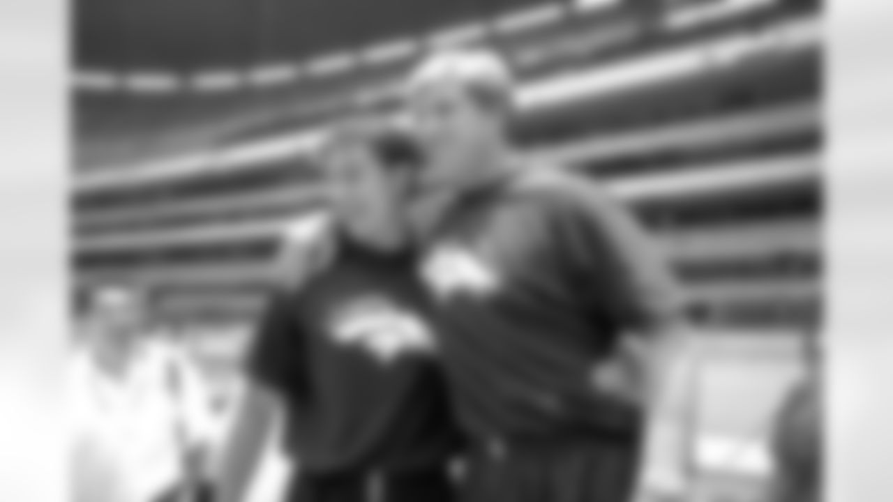 John Elway poses for the Mexican press with M. Martos against the Miami Dolphins at Estadio Guillermo Canedo (Mexico City, American Bowl) on August 4, 1997.