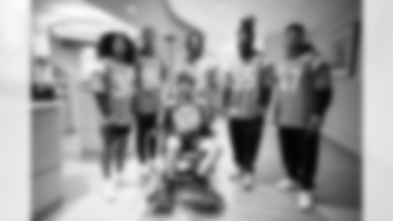 Kyrese White, Joaquin Davis, Pat Bryant, Jordan Turner, Karene Reid and other Denver Broncos rookies visit with children at Children's Hospital Colorado in Aurora, Colorado on June 2, 2025. Photo by Ben Swanson / Denver Broncos