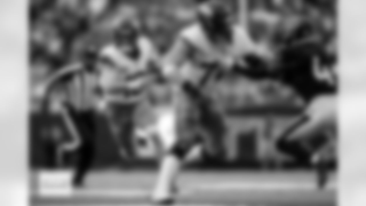 Denver Broncos offensive tackle Garett Bolles (72) blocks for quarterback Bo Nix (10) as he runs during the Broncos' Week 9 game against the Houston Texans at NRG Stadium in Houston, Texas on November 2, 2025. Photo by Gabriel Christus / Denver Broncos