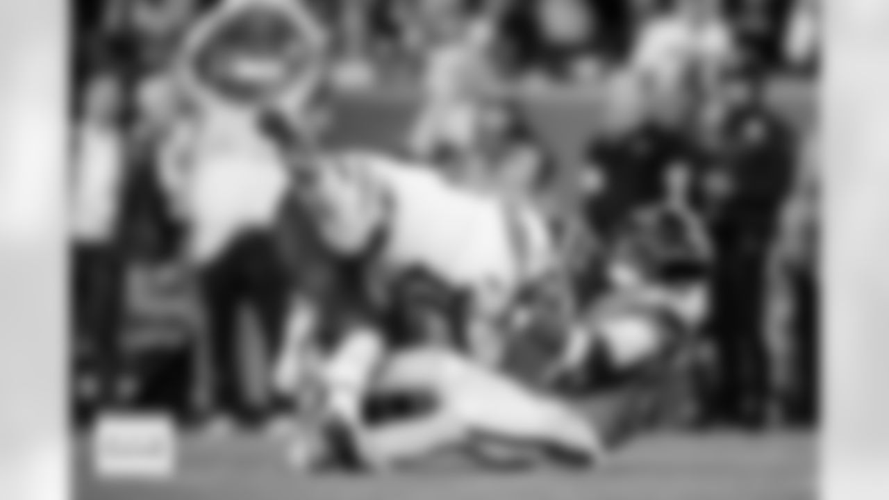 Denver Broncos cornerback Ja'Quan McMillian (29) sacks Kansas City Chiefs quarterback Patrick Mahomes (15) during the Broncos' Week 11 game against the Kansas City Chiefs at Empower Field at Mile High in Denver, Colorado on November 16, 2025. Photo by Ben Swanson / Denver Broncos