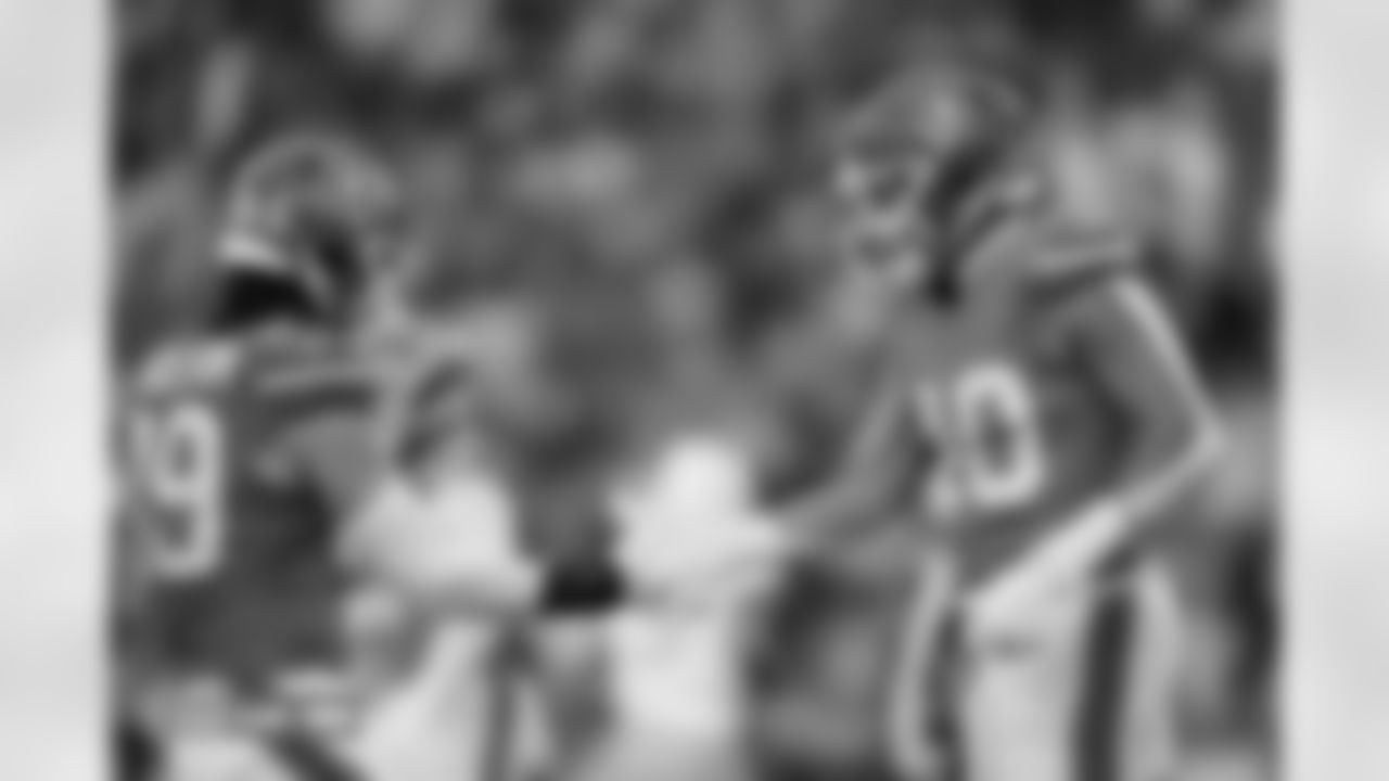 Alex Singleton (49) and Justin Strnad (40) during the Broncos' Week 18 game against the Los Angeles Chargers at Empower Field at Mile High in Denver, Colorado on January 4, 2026. Photo by Ben Swanson / Denver Broncos