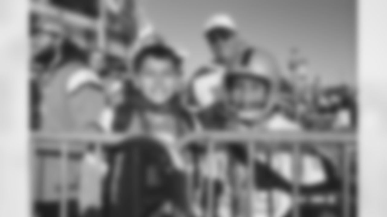 Denver Broncos fans photographed on film during the Broncos' Week 10 game against the Las Vegas Raiders at Empower Field at Mile High in Denver, Colorado on November 7, 2025. Photo by Ben Swanson / Denver Broncos