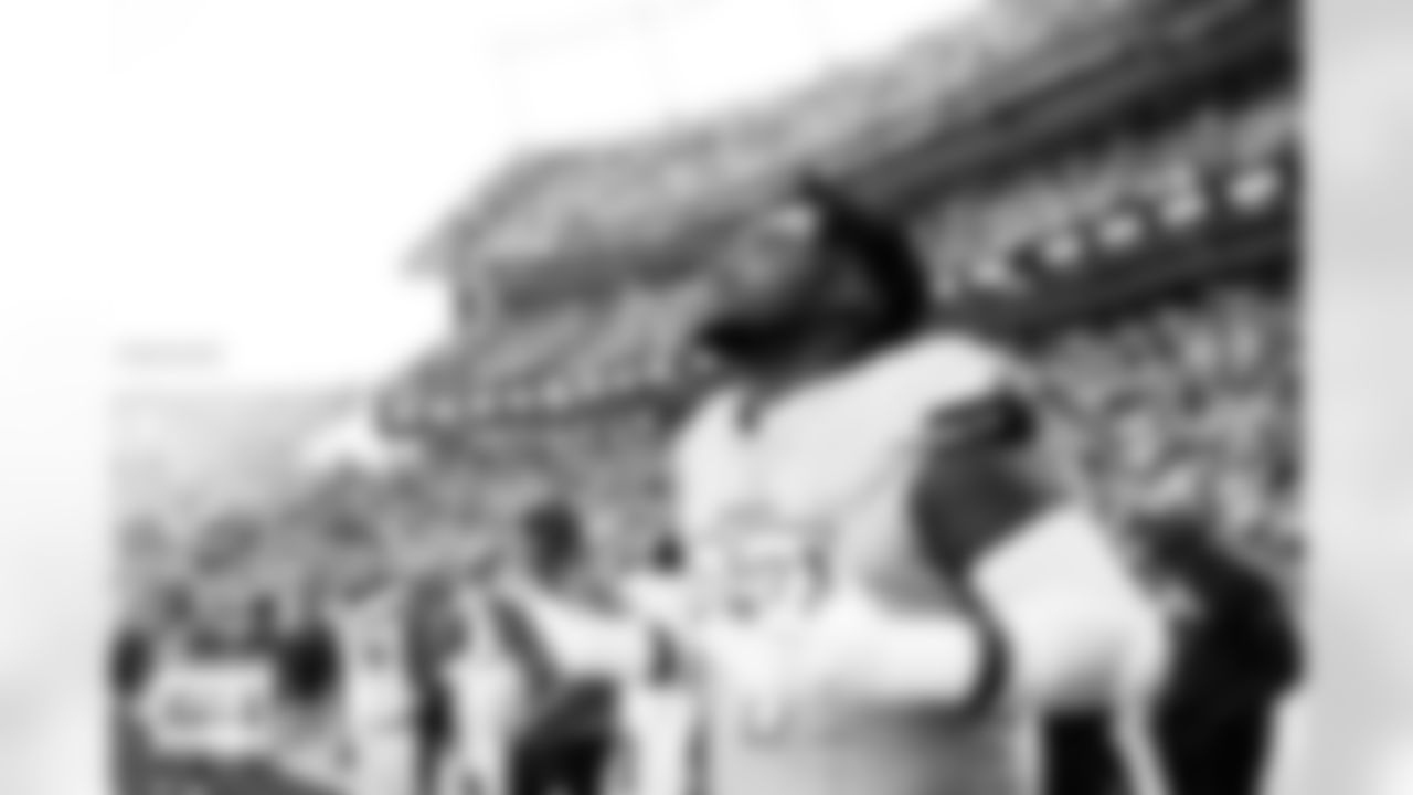 Denver Broncos defensive tackle Malcolm Roach (97) says a prayer before the Broncos' Week 11 game against the Kansas City Chiefs at Empower Field at Mile High in Denver, Colorado on November 16, 2025. Photo by Ben Swanson / Denver Broncos