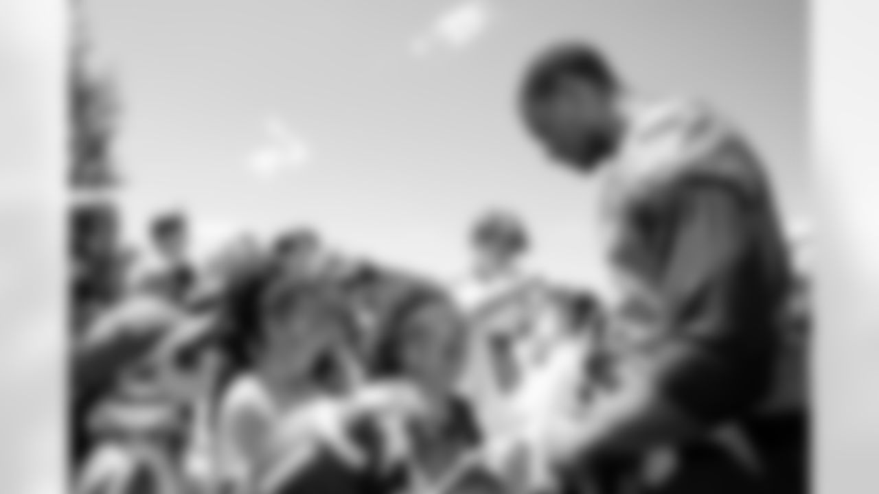Pat Surtain II signs autographs for fans during a training camp practice at Broncos Park Powered by CommonSpirit on July 26, 2025 in Englewood, Colorado. Photo by Ben Swanson / Denver Broncos