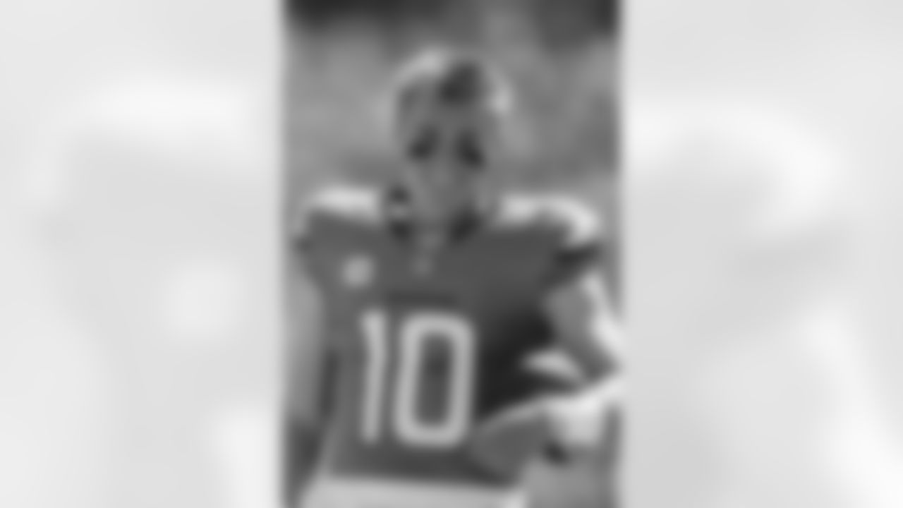 Denver Broncos quarterback Bo Nix (10) smiles on the sideline during the Broncos' Week 1 game against the Tennessee Titans at Empower Field at Mile High in Denver, Colorado on September 7, 2025. Photo by Gabriel Christus / Denver Broncos