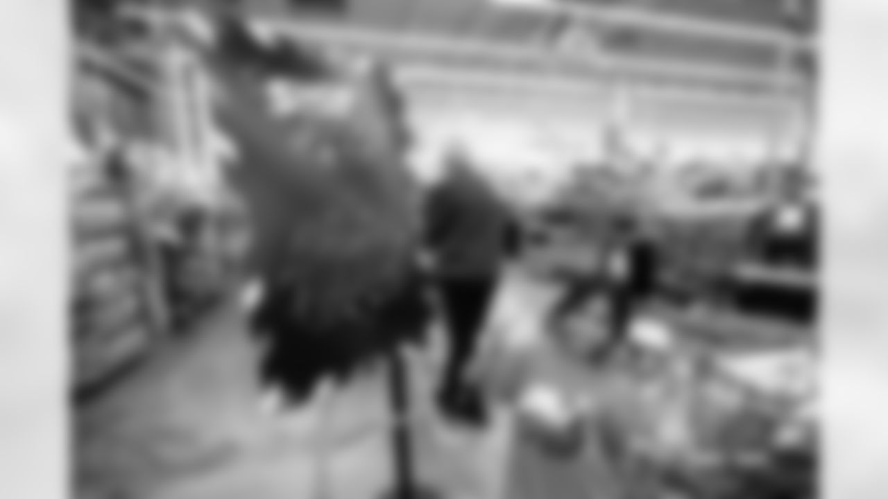 Children from the Boys & Girls Club participate in a Shop with a Jock shopping spree with Broncos players, alumni and cheerleader alumni in Aurora, Colorado on December 15, 2025. Photo by Ben Swanson / Denver Broncos