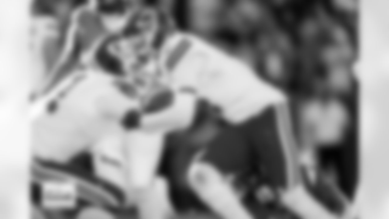 Denver Broncos safety Talanoa Hufanga (9) tackles Kansas City Chiefs wide receiver Rashee Rice (4) during the Broncos' Week 11 game against the Kansas City Chiefs at Empower Field at Mile High in Denver, Colorado on November 16, 2025. Photo by Ben Swanson / Denver Broncos