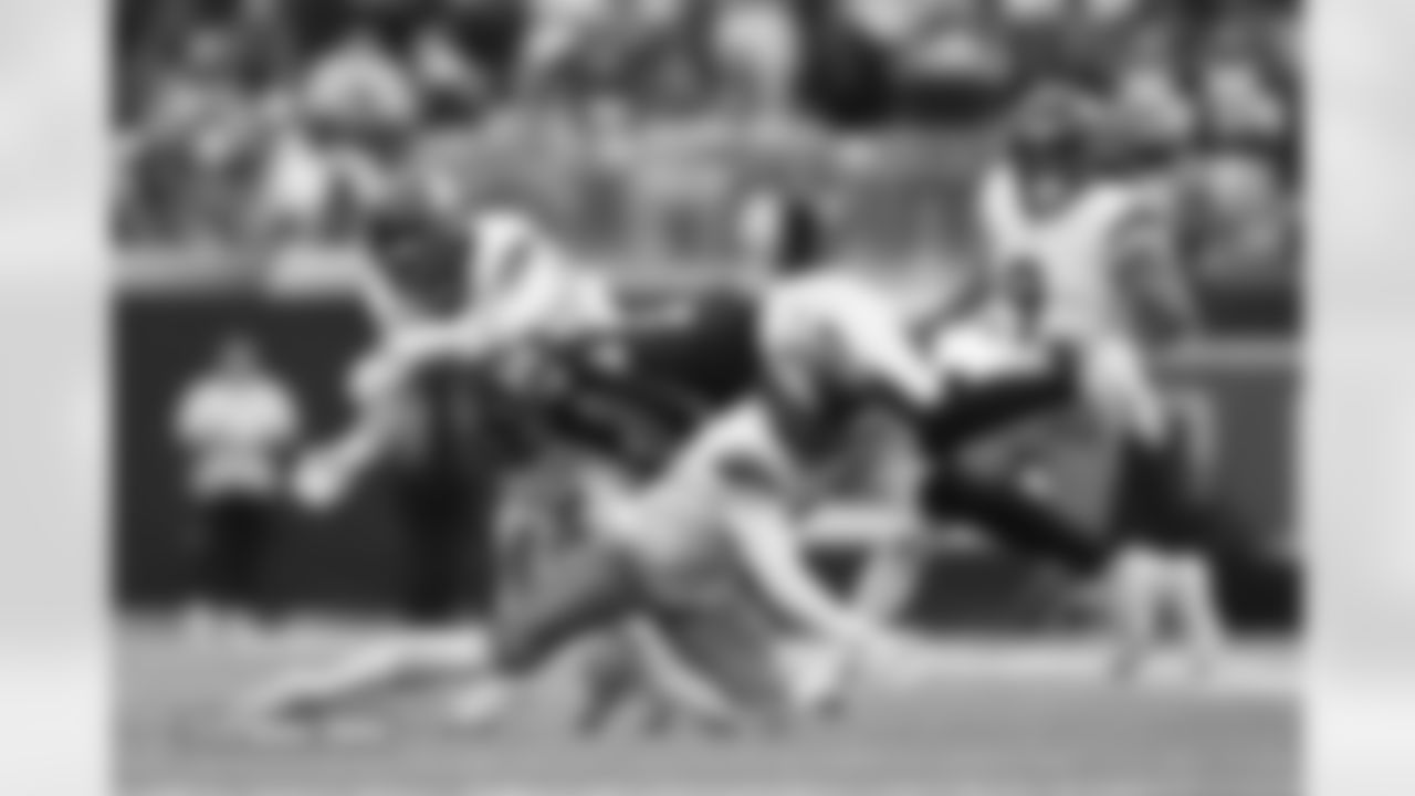 Riley Moss  and Justin Strnad during the Broncos' Week 9 game against the Houston Texans at NRG Stadium in Houston, Texas on November 2, 2025. Photo by Ben Swanson / Denver Broncos